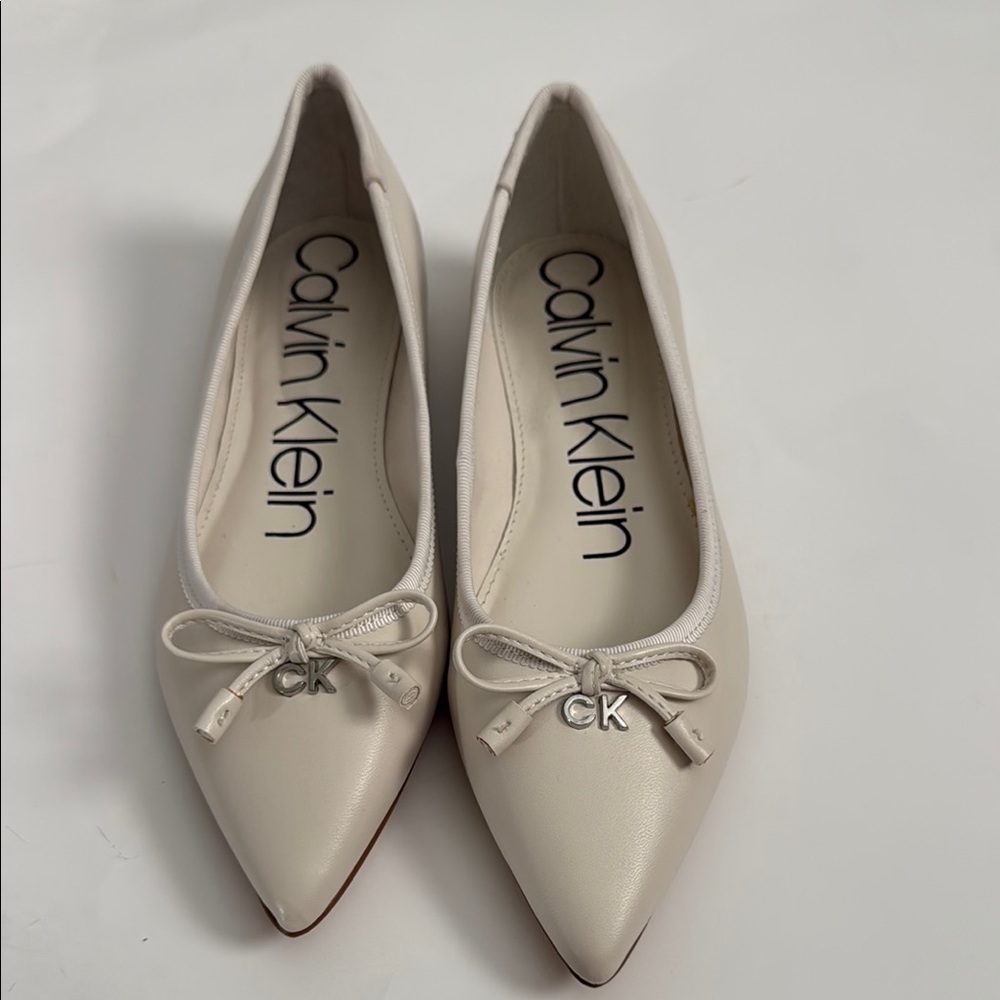 Calvin Klein Cream Flats with Pointed Toe and Minimalist Design women size 5.5